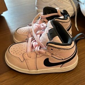 Baby pink and black Jordans